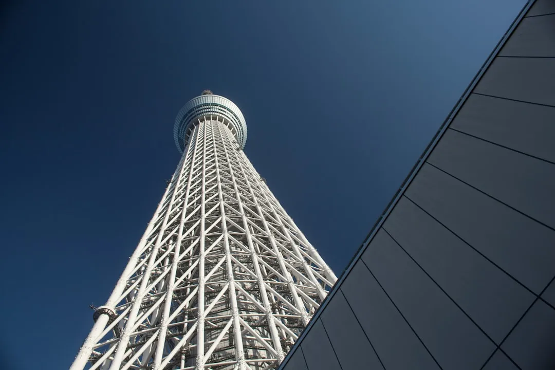 low angle photography of gray high rise building
