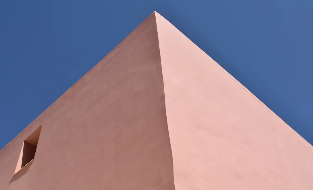 A tall building with a clock on the top of it