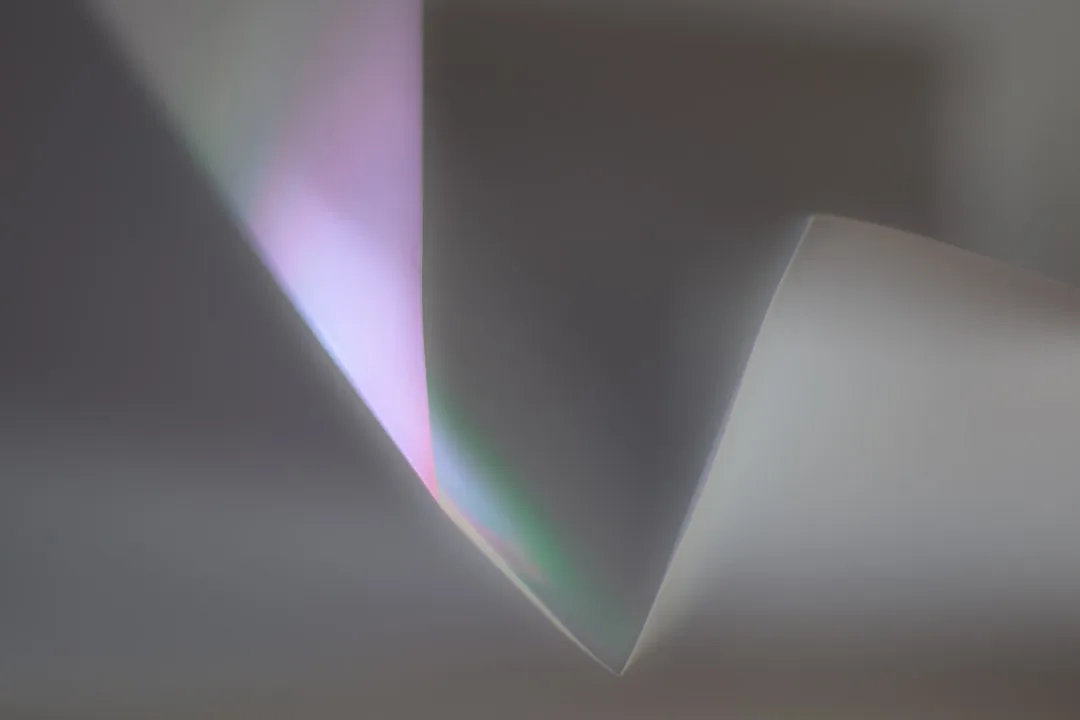 white green and purple textile